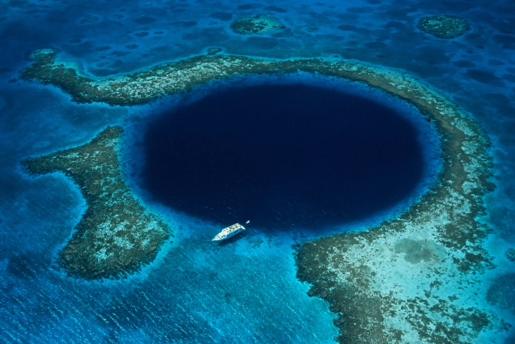 The giant hole is located just off the coast of Belize (Schafer & Hill/Getty Images)