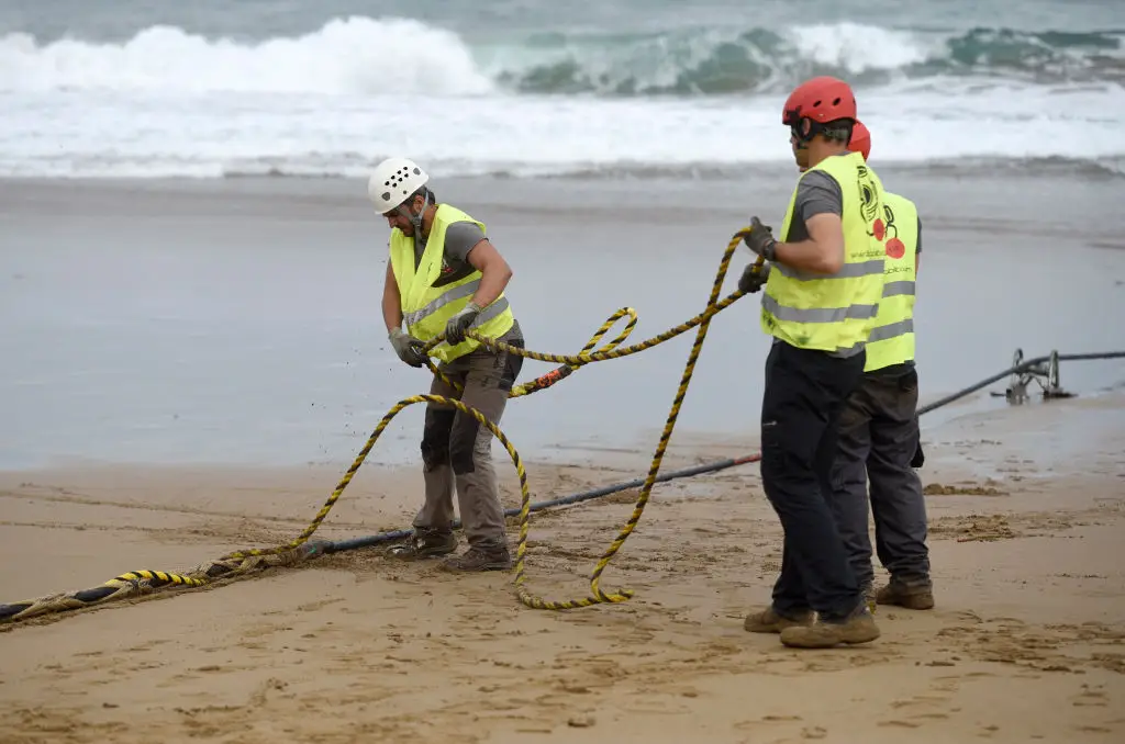 Underwater cables like this cost a lot and take a long time to build (Ander Gillenea/AFP via Getty Images)