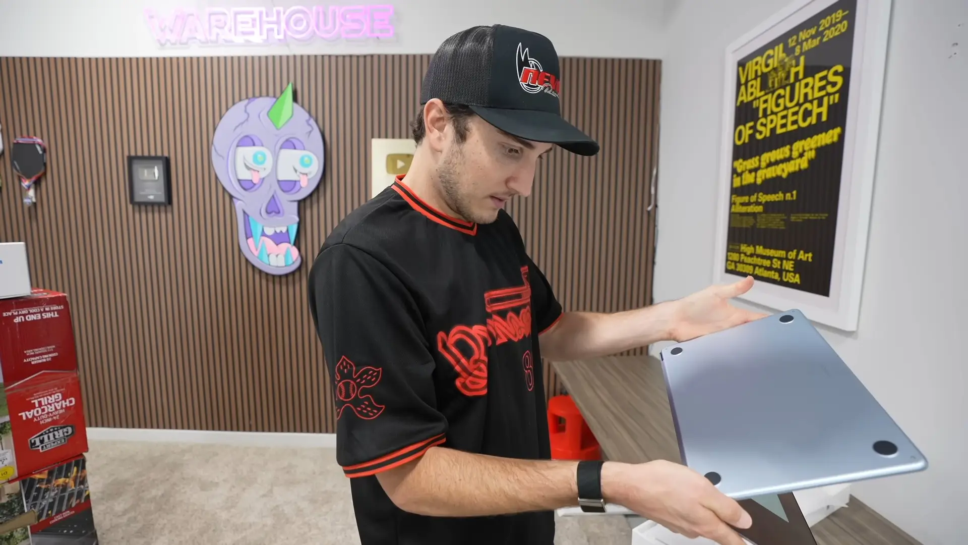 He quickly found a MacBook Air that made up most of the initial price he'd paid for the pallet (YouTube/Harrison Nevel)