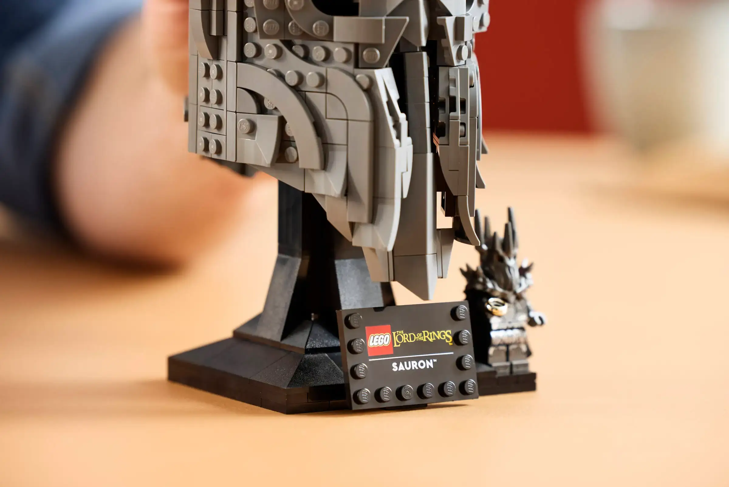 The LEGO kit comes with a display stand and name plaque (LEGO)