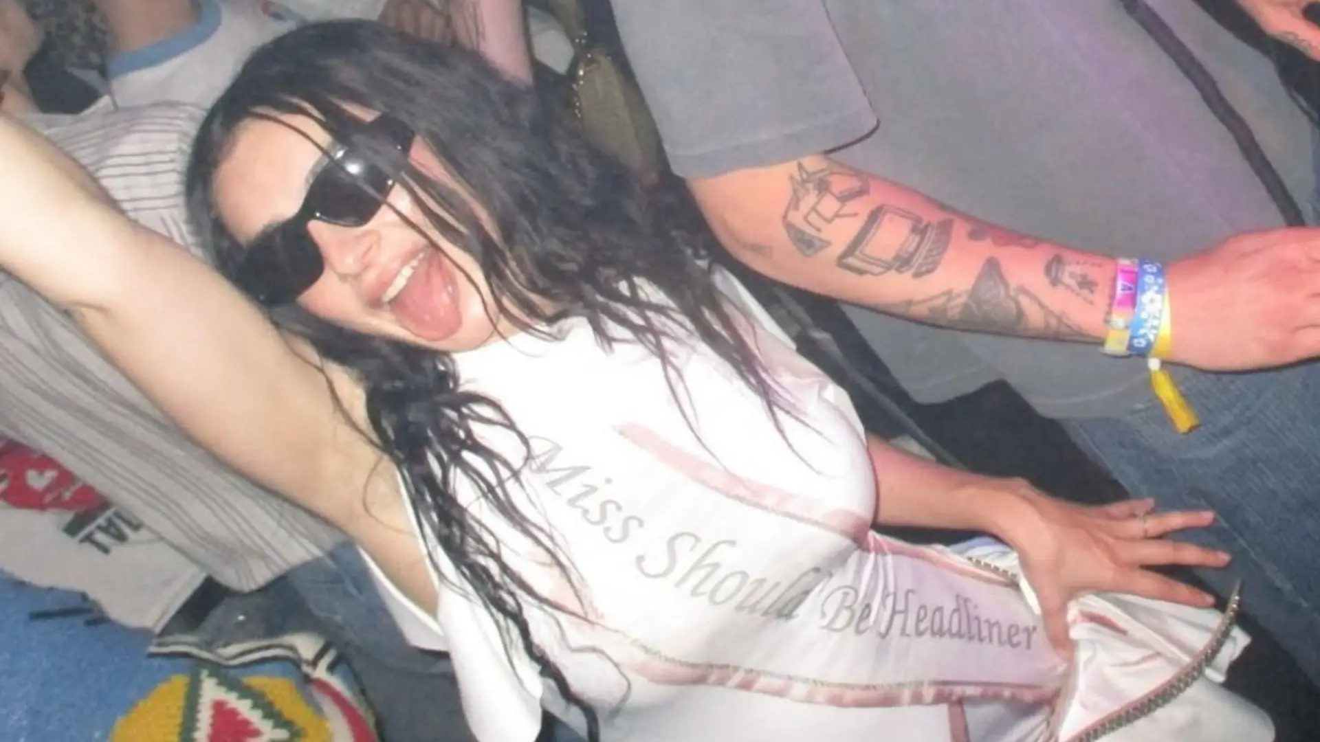 Why Is The Internet Bullying Charli XCX Over A Sash? Breaking Down The ~Controversy~