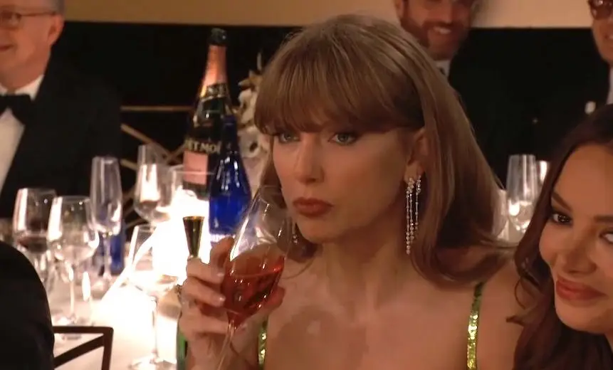 Taylor Swift Has Iconic Reaction To Jo Koy’s Joke About Her At The Golden Globes