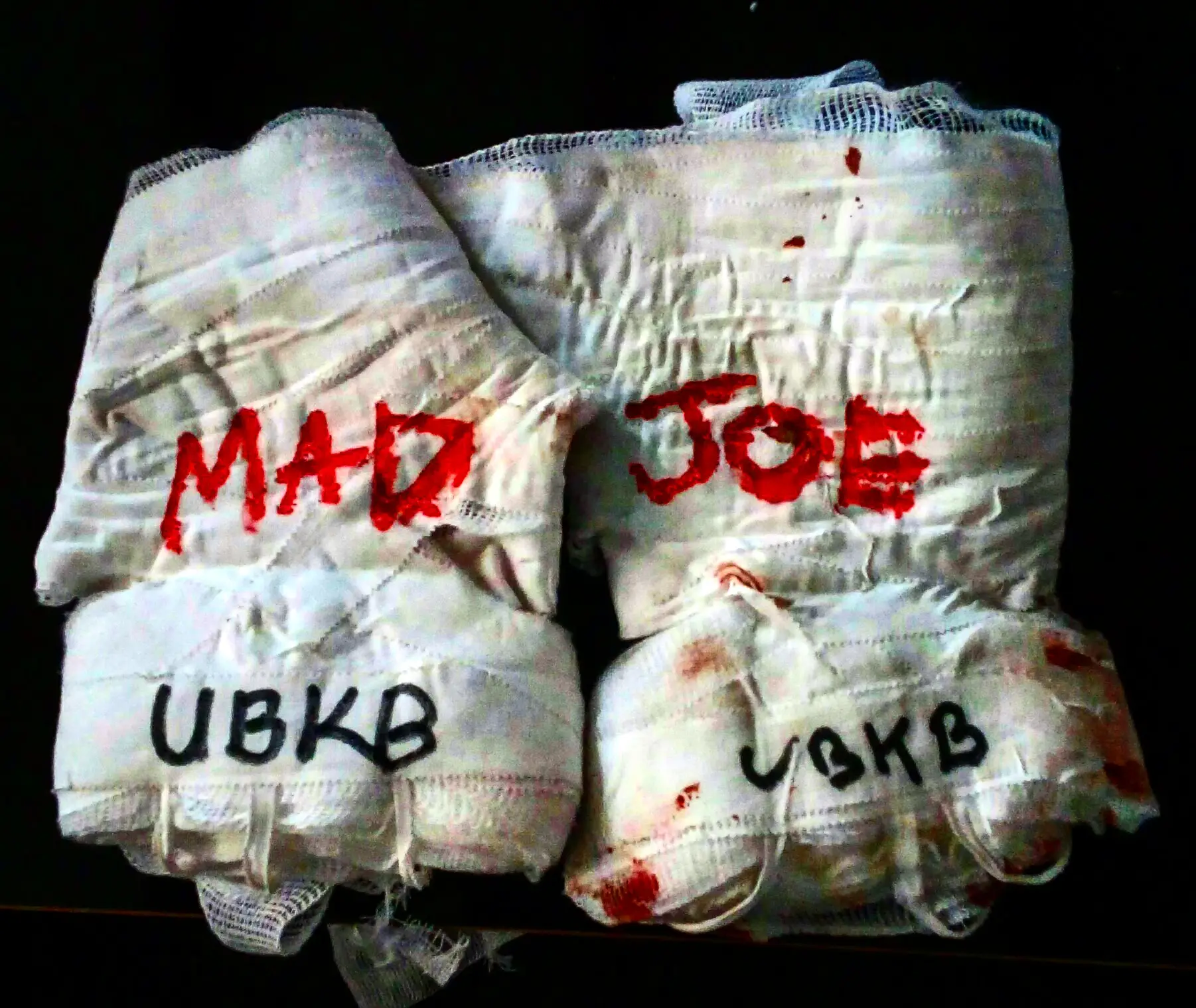 'Mad' Joe Clarke's gloves post bout.